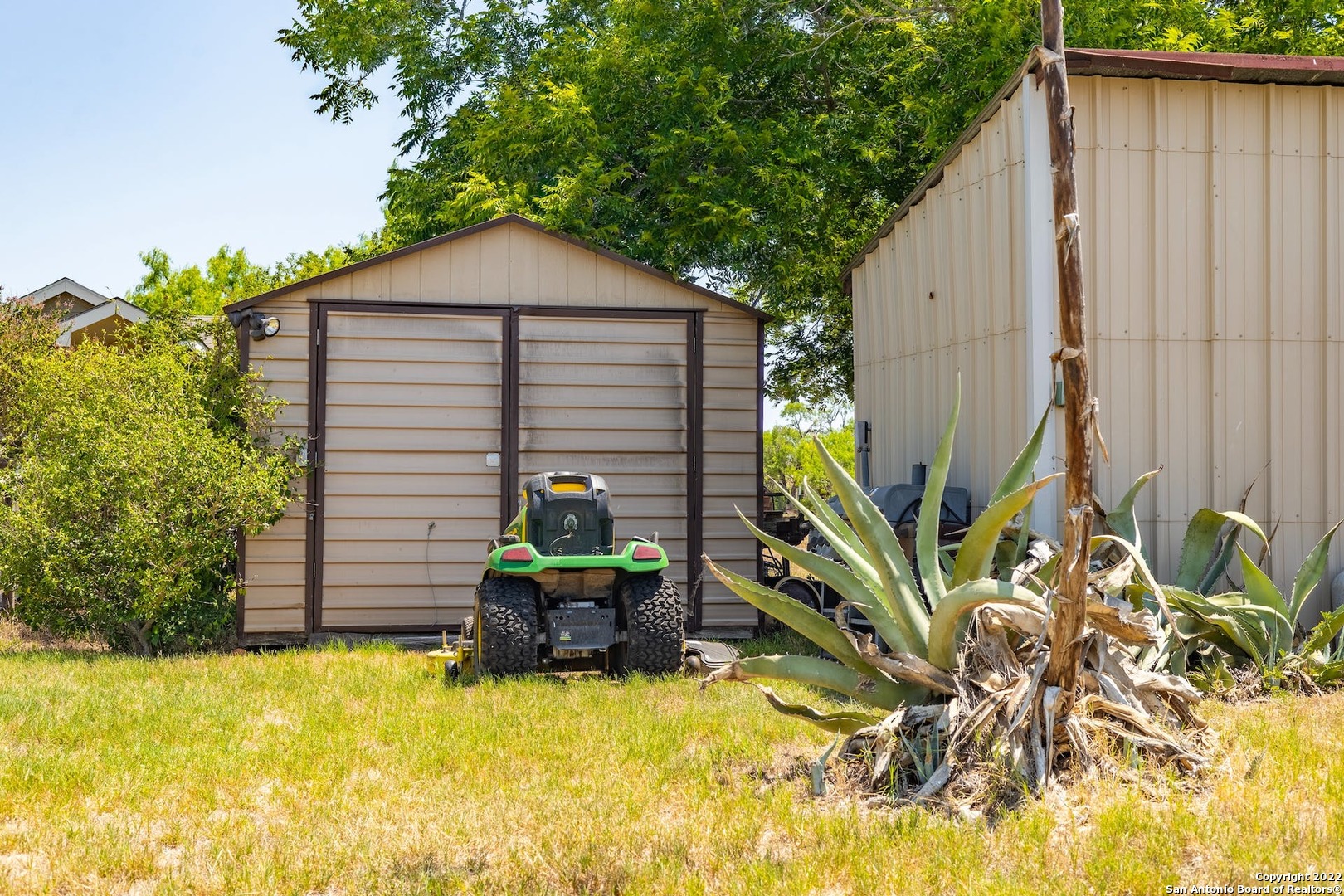 11801 Jim Terrill Road Adkins, TX 78101 - Photo 45 of 46 a backyard of a house with seating space