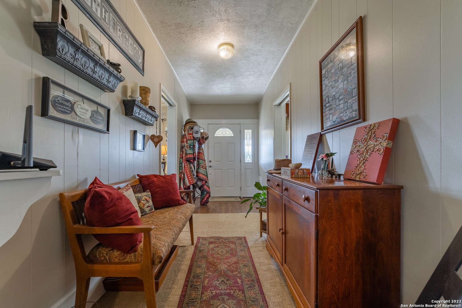11801 Jim Terrill Road Adkins, TX 78101 - Photo 7 of 46 a living room with furniture and a painting