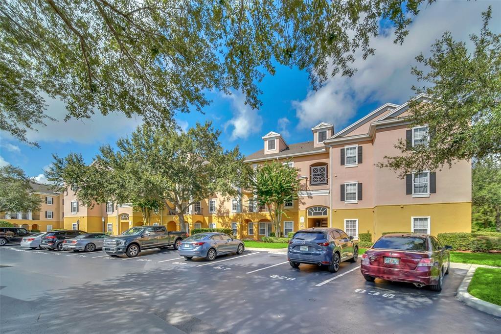 3611 Conroy Road, Unit 835 Orlando, FL 32839 - Photo 1 of 1 a car parked in front of a house
