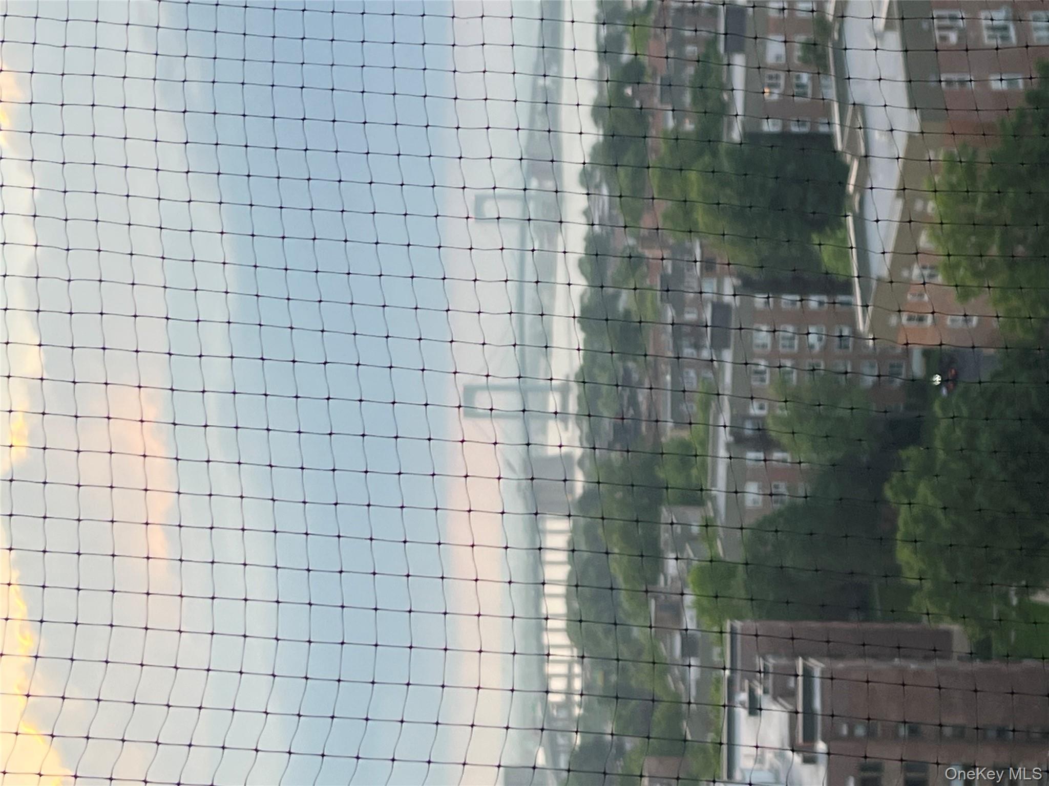 2 Bay Club Drive, Unit 16N Queens, NY 11360 - Photo 5 of 16 Water & bridge view from terrace.