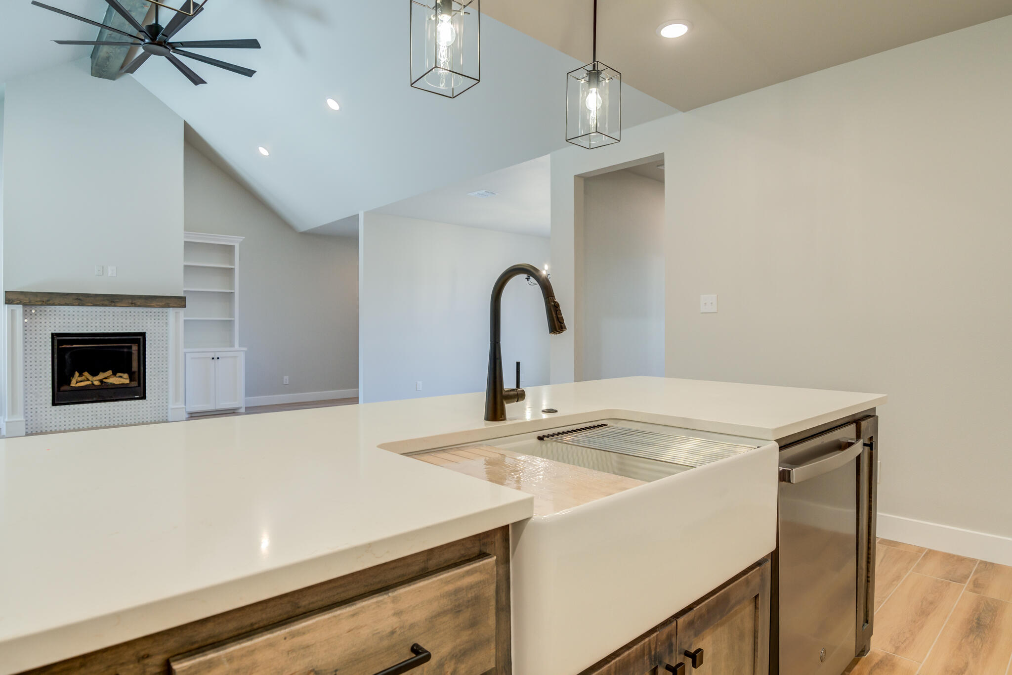 7805 54th Street Lubbock, TX 79407 - Photo 28 of 55 a close view of a sink a counter space and a ceiling fan