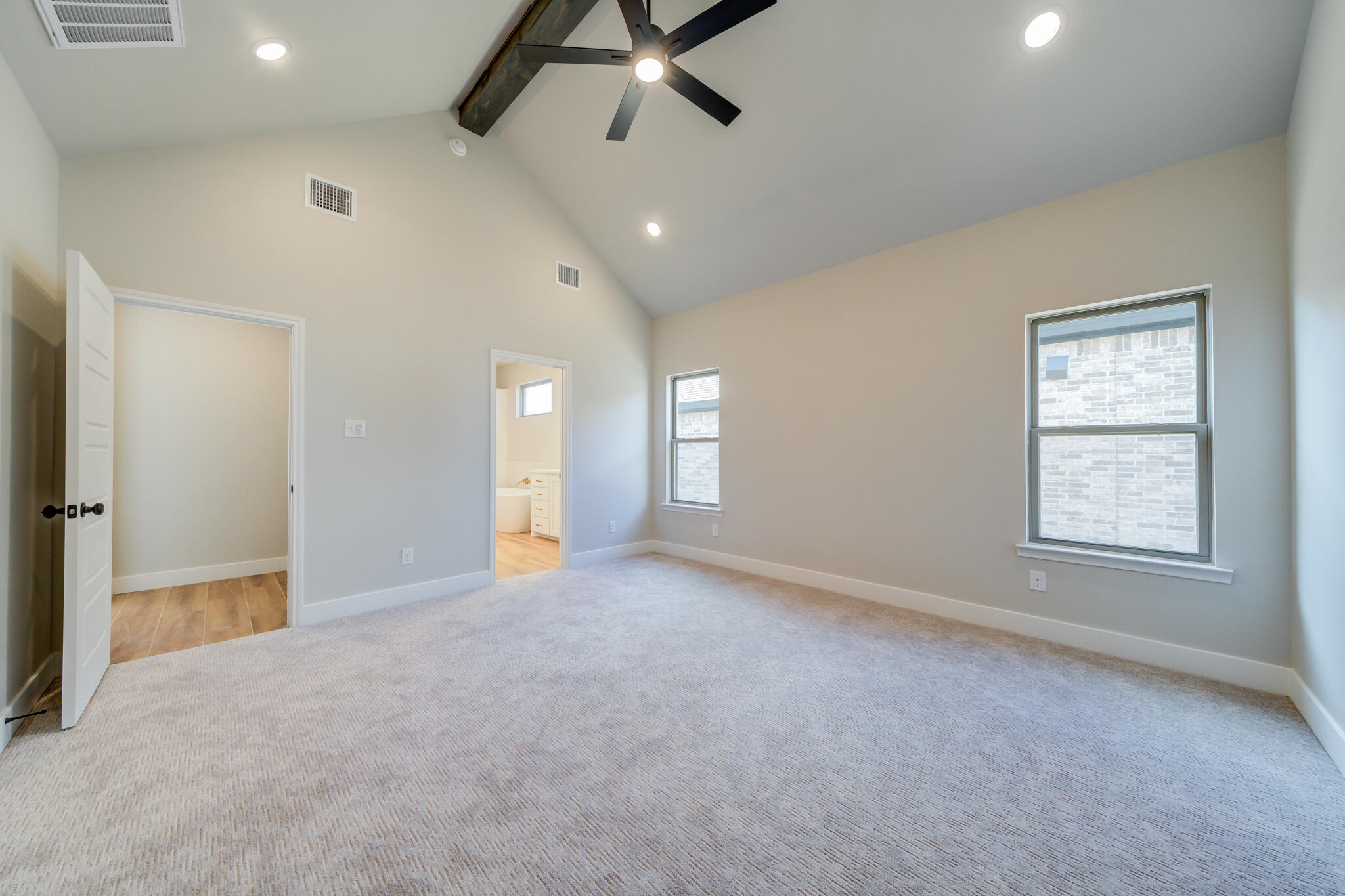 7805 54th Street Lubbock, TX 79407 - Photo 45 of 55 an empty room with windows and ceiling fan