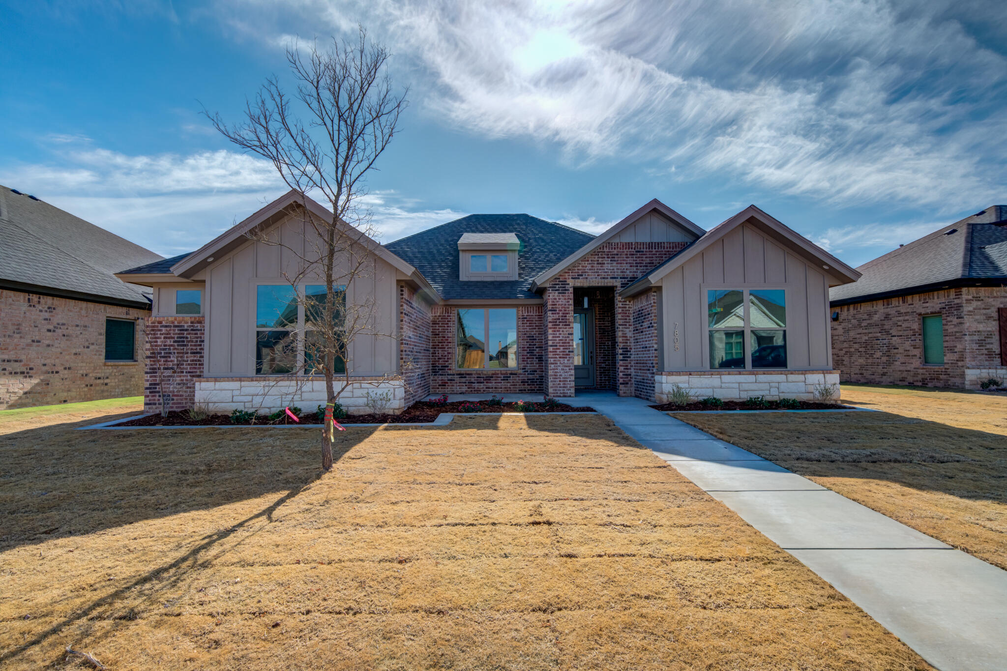 7805 54th Street Lubbock, TX 79407 - Photo 6 of 55 a front view of house with yard