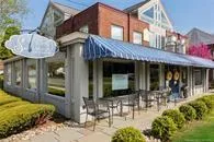 a view of a chairs and table in the patio