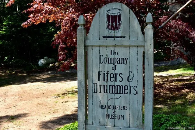 a sign on the side of the road