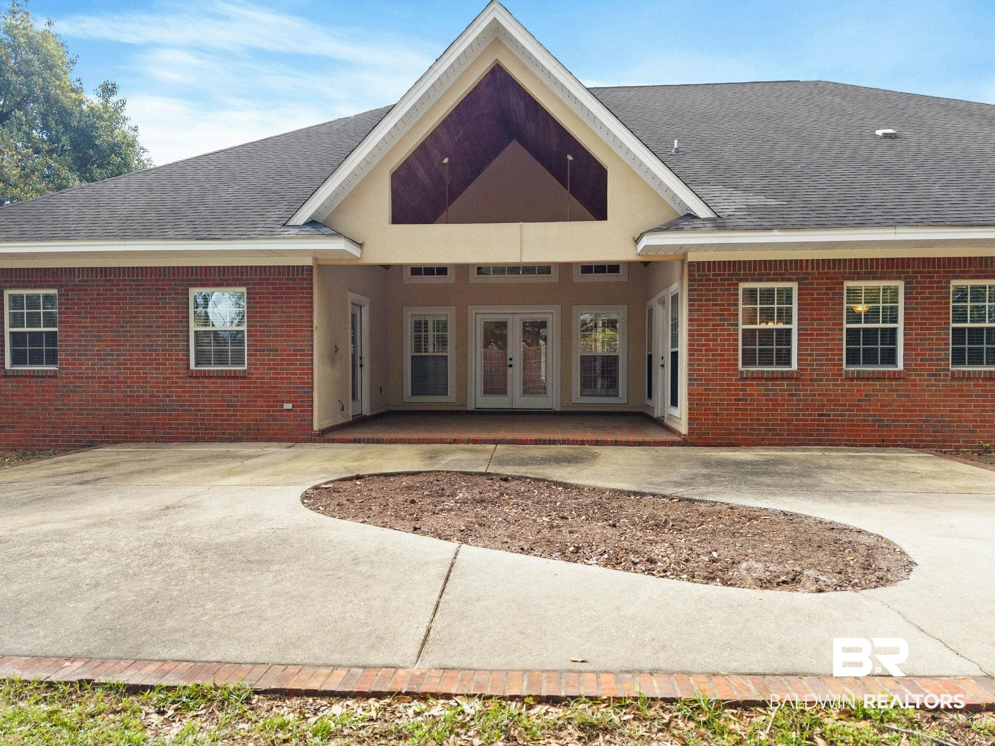 3668 Claridge Road North Mobile, AL 36608 - Photo 88 of 100 Back of property with french doors, brick siding, and a shingled roof