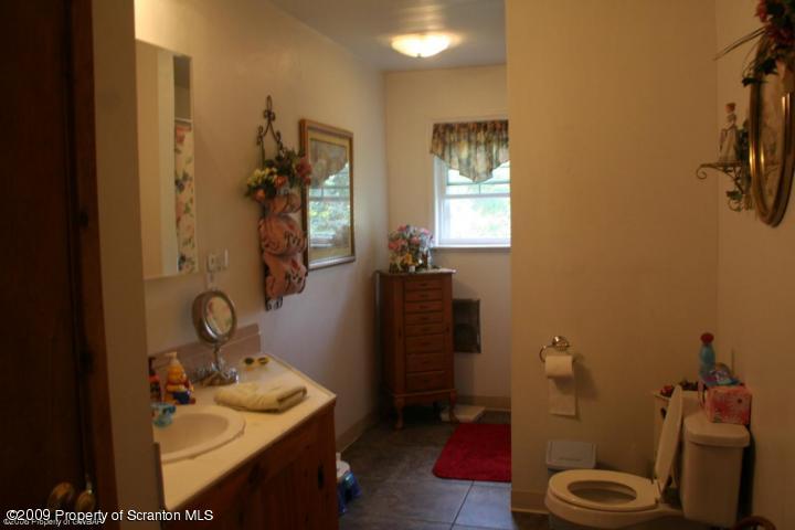 38 Zarychta Road Tunkhannock, PA 18657 - Photo 6 of 6 a bathroom with a sink toilet and shower
