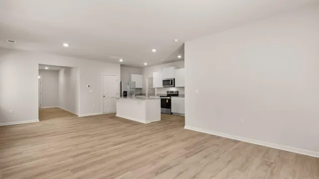 a view of kitchen view wooden floor