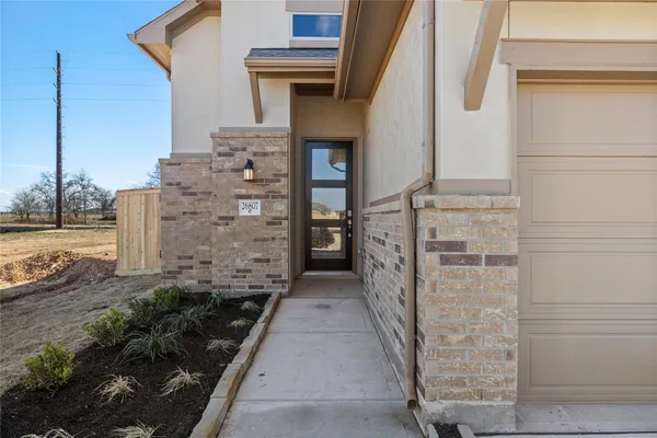 a view of a pathway along the building