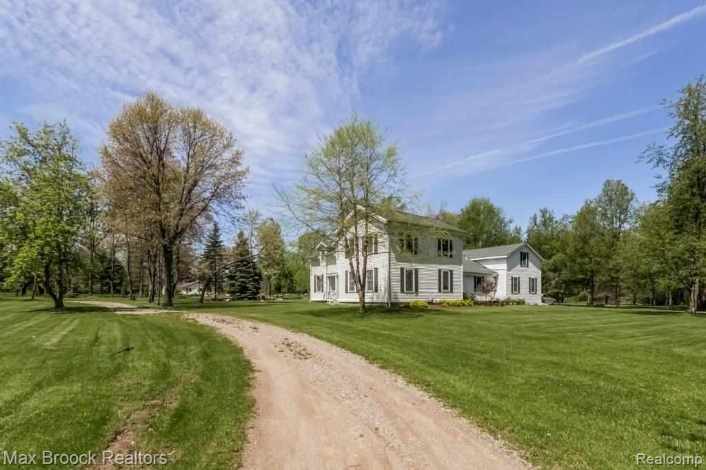 1575 East Leonard Road Leonard, MI 48367 - Photo 2 of 39 002-Front_View-1699331-medium.jpg