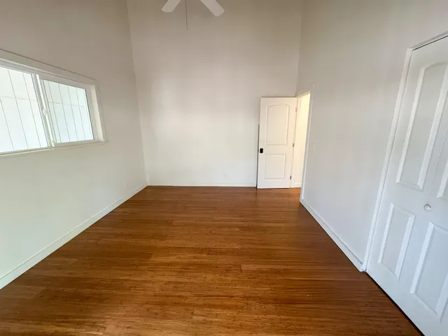 a bathroom with a sink toilet and mirror