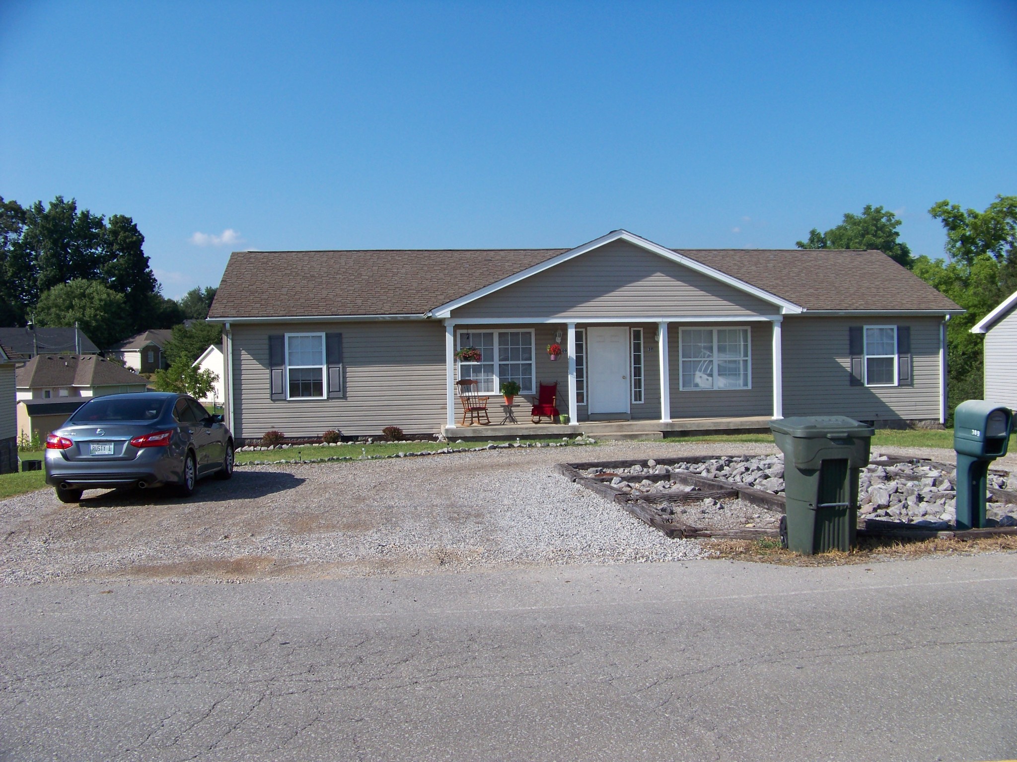 311 Reid Road Springfield, TN 37172 - Photo 3 of 16 a house view with a outdoor space