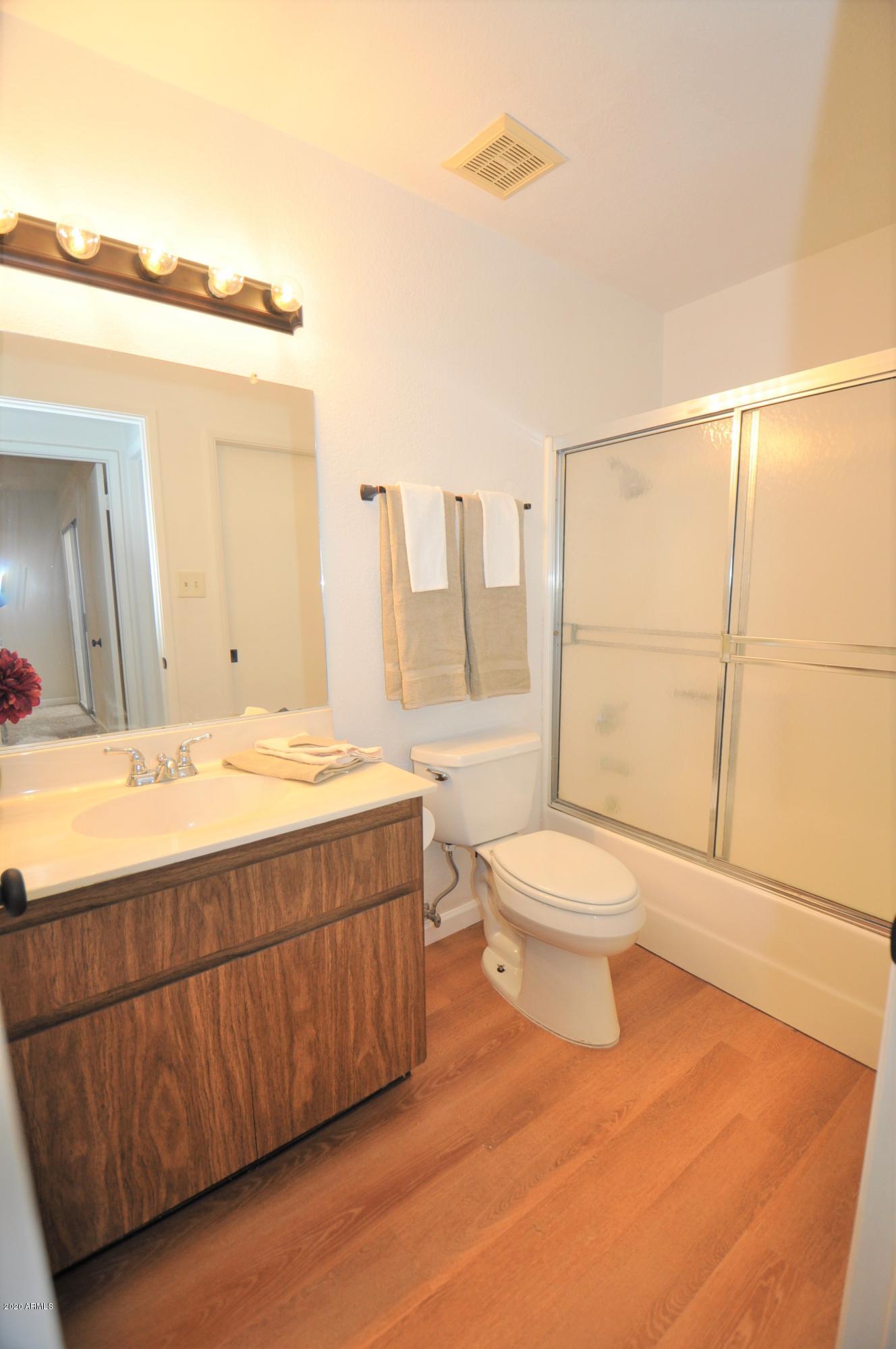 97 North Cooper Road, Unit 113 Chandler, AZ 85225 - Photo 13 of 16 Hall Bathroom