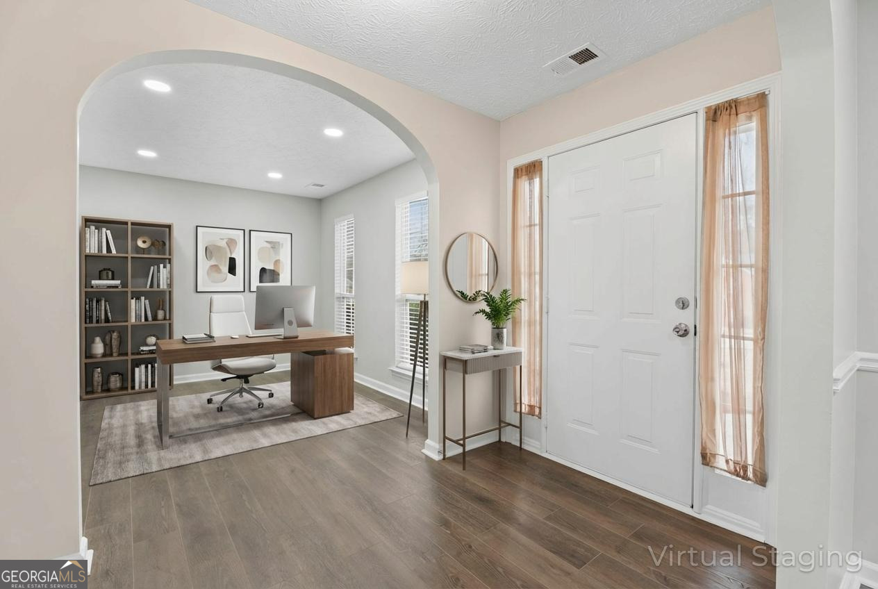 10768 Starling Trail Hampton, GA 30228 - Photo 2 of 49 Virtually staged photo may include furniture and fixtures not included with home.