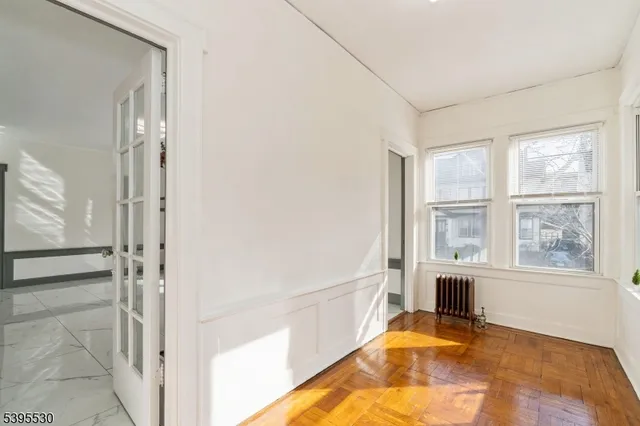 a bathroom with a tub and shower
