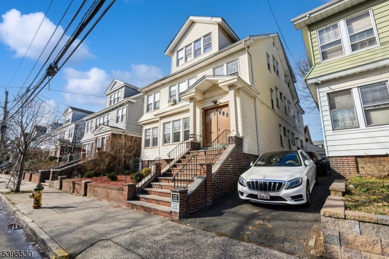 41 Poe Avenue Newark, NJ 07106 - Photo 35 of 44 a view of a street with cars