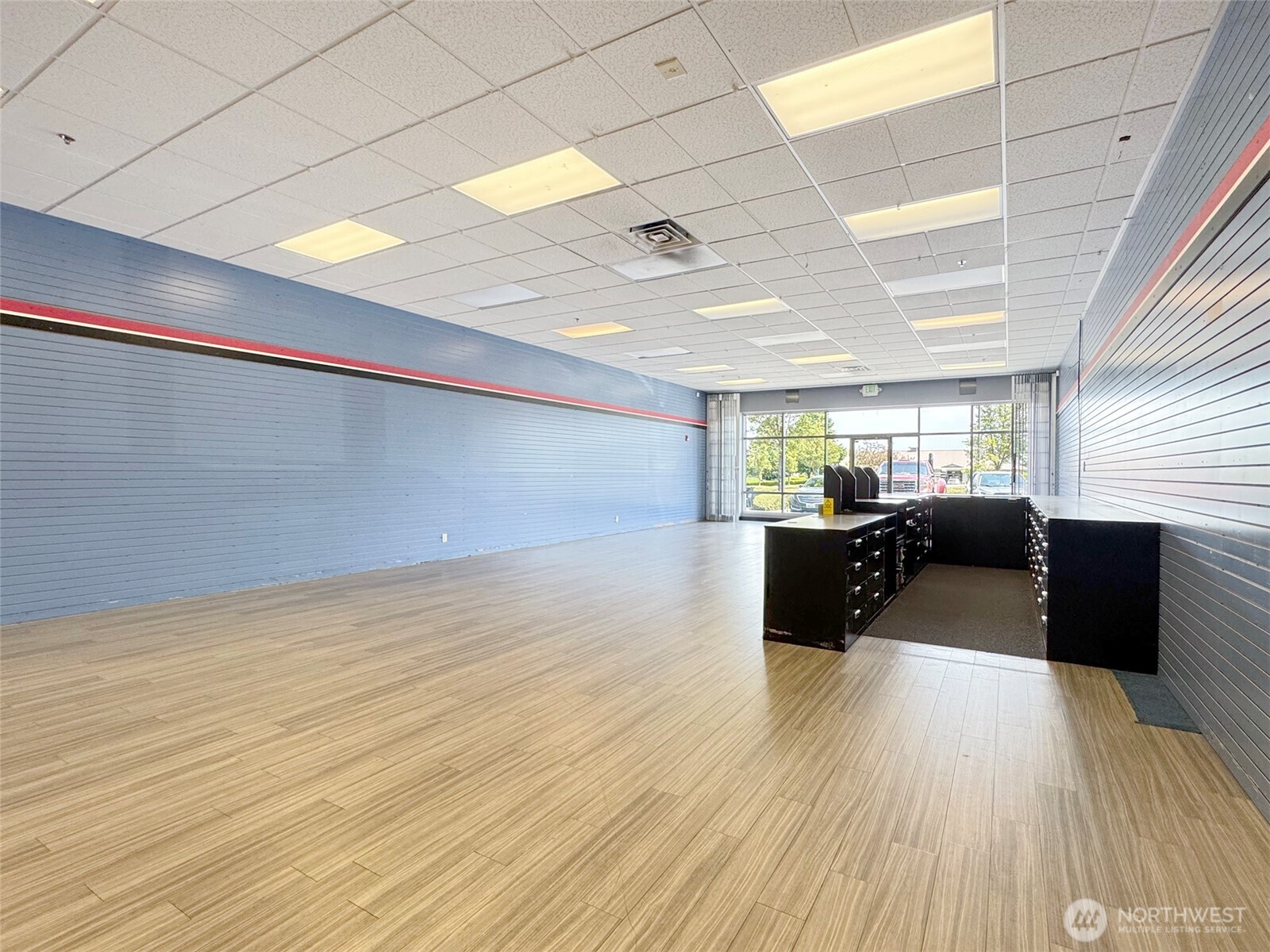 1400 West Washington Street, Unit 107 Sequim, WA 98382 - Photo 14 of 26 a view of a room with wooden floor