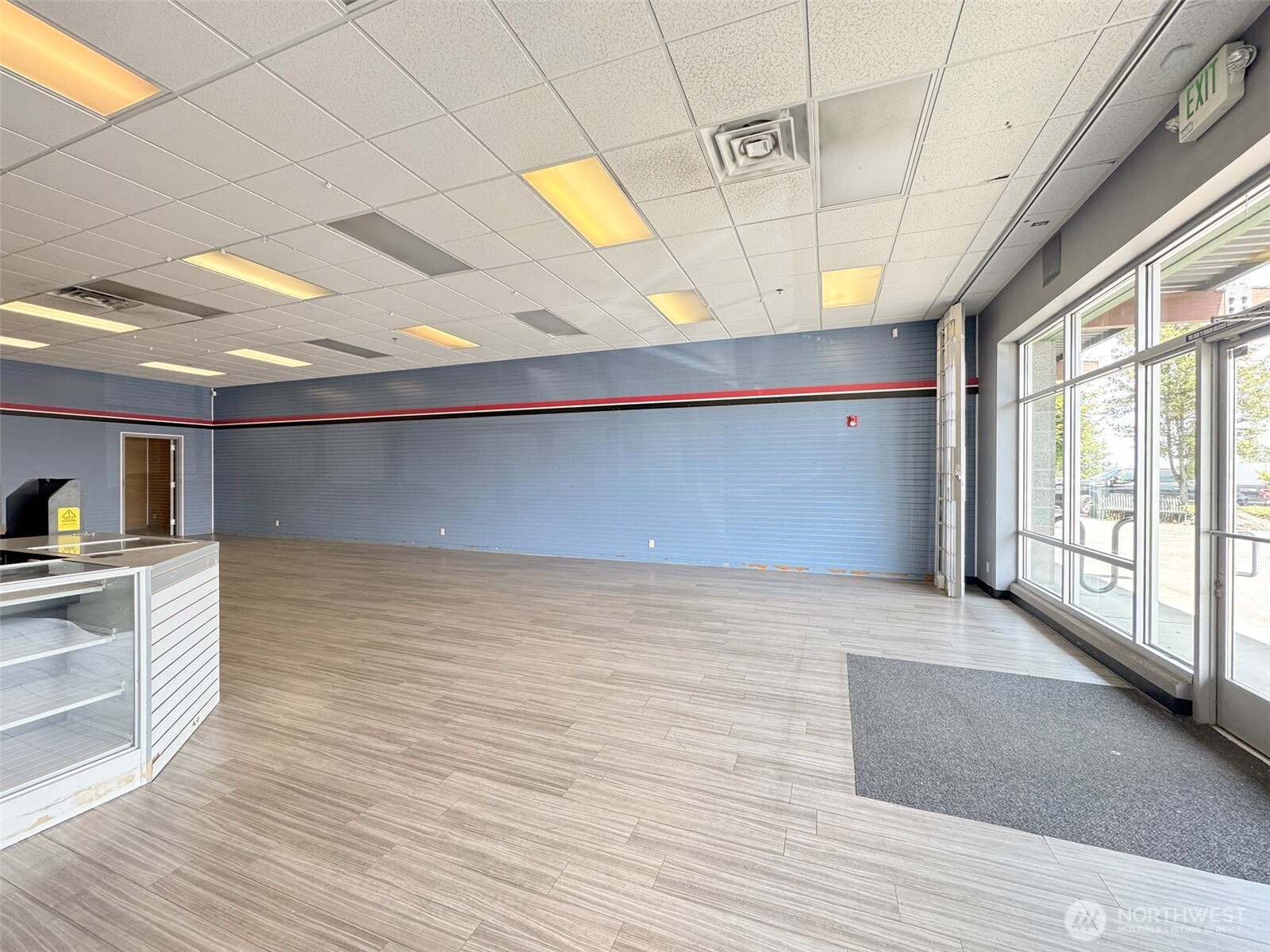 1400 West Washington Street, Unit 107 Sequim, WA 98382 - Photo 4 of 26 a view of an empty room with a window
