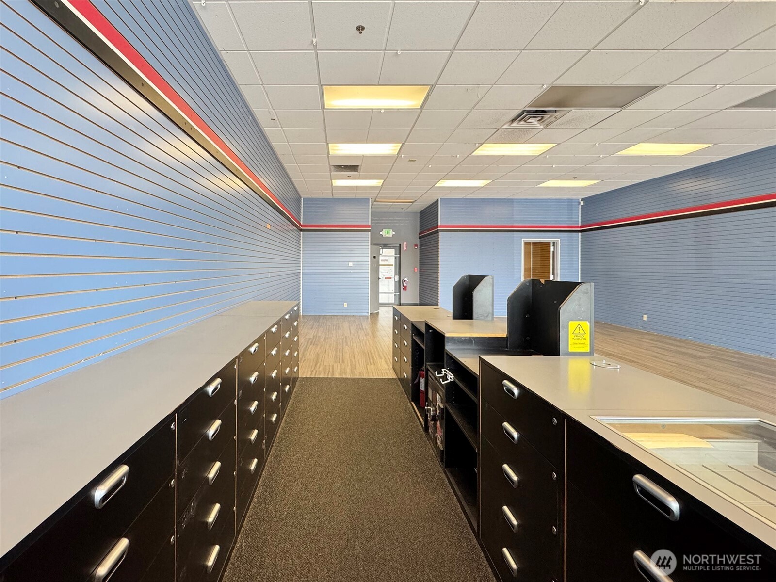 1400 West Washington Street, Unit 107 Sequim, WA 98382 - Photo 7 of 26 a kitchen with counter top space and sink
