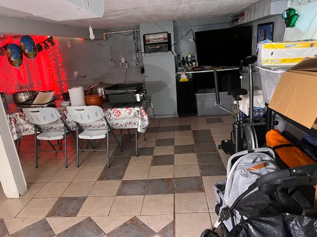 a bathroom with a sink a toilet and a shower