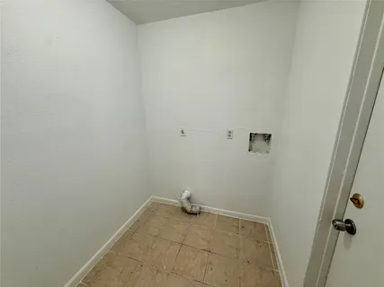 a bathroom with a granite countertop window