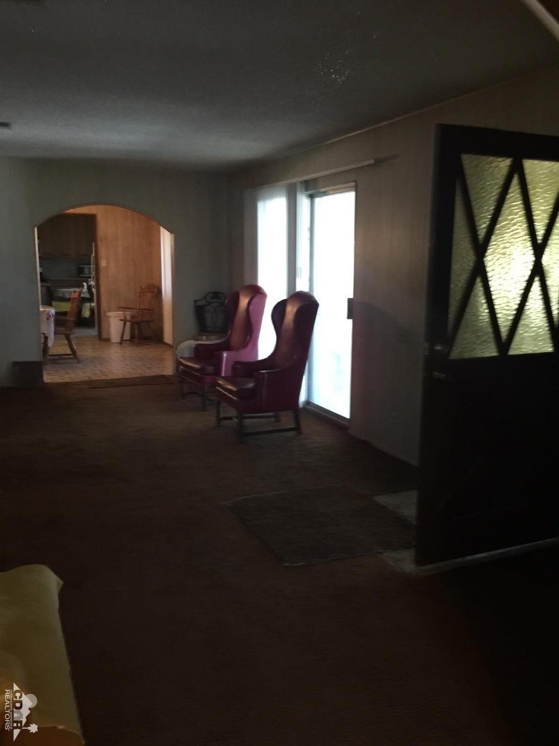 46751 Arabia Street Indio, CA 92201 - Photo 14 of 42 a living room with furniture and a window