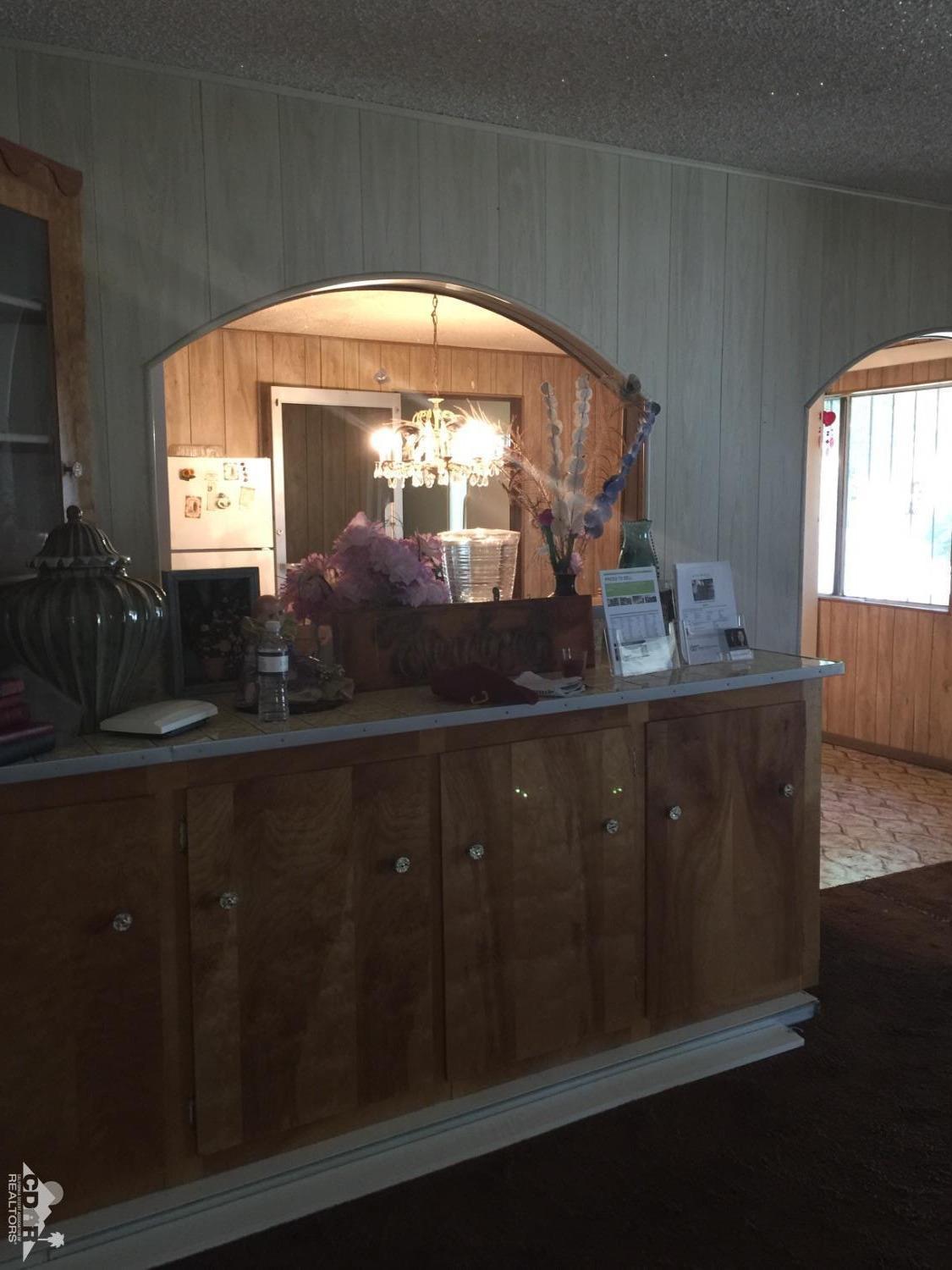 46751 Arabia Street Indio, CA 92201 - Photo 21 of 42 a bathroom with a sink and mirror