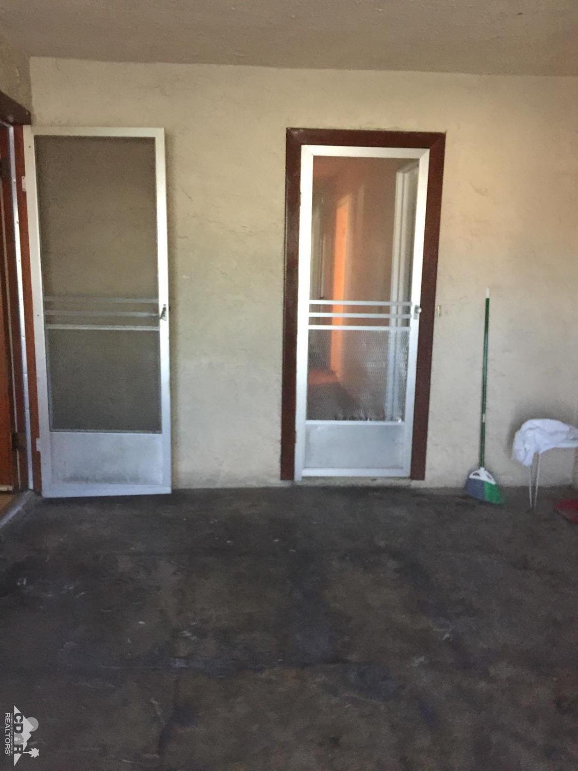 46751 Arabia Street Indio, CA 92201 - Photo 29 of 42 a view of empty room with wooden floor