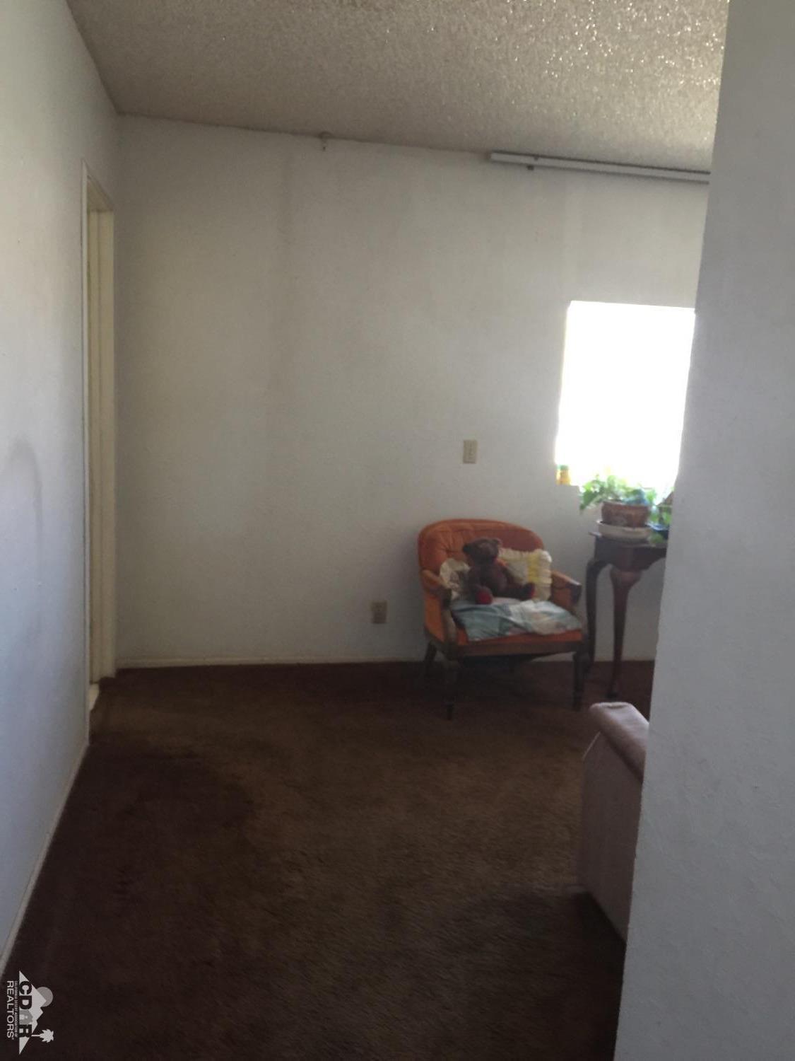 46751 Arabia Street Indio, CA 92201 - Photo 31 of 42 a living room with furniture