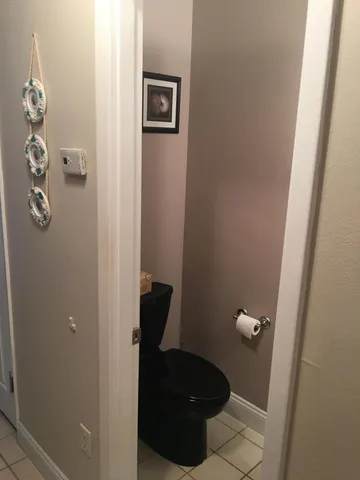 a bathroom with a toilet and a sink