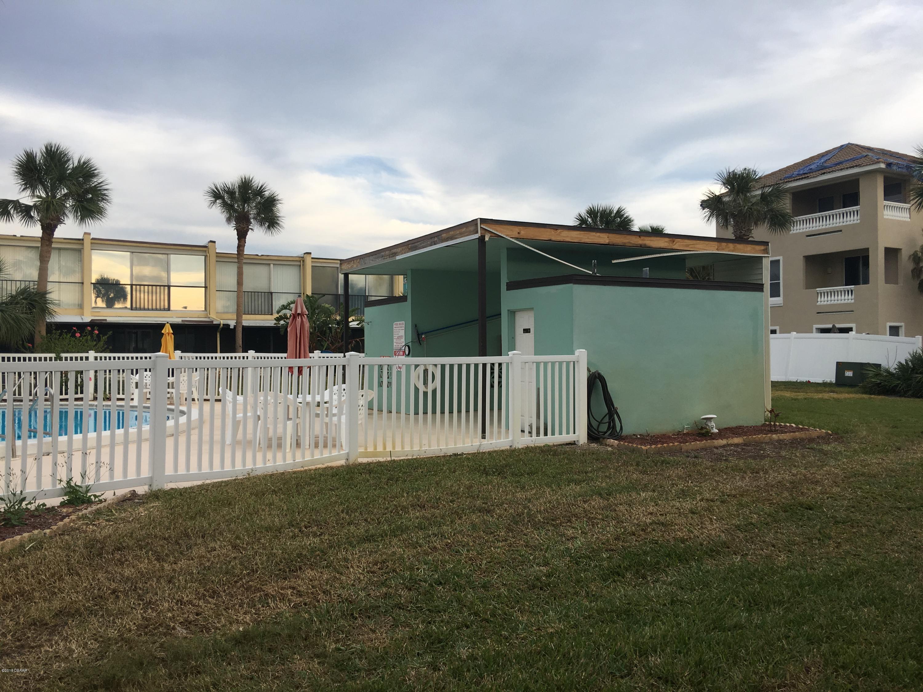 5500 Ocean Shore Boulevard, Unit 52 Ormond Beach, FL 32176 - Photo 16 of 33 a view of a house with backyard and entertaining space
