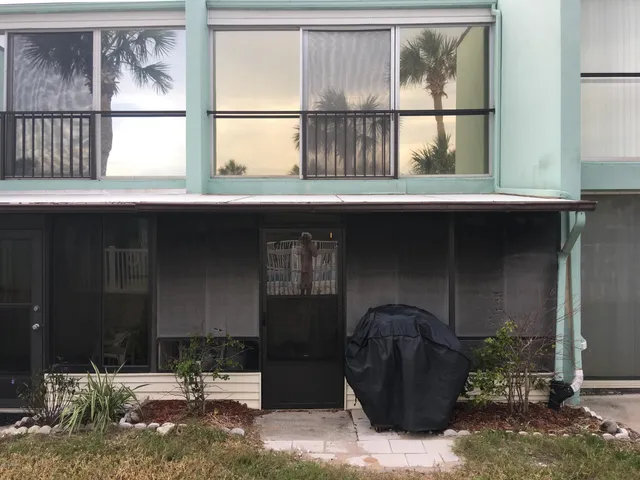 a front view of a house with outdoor space