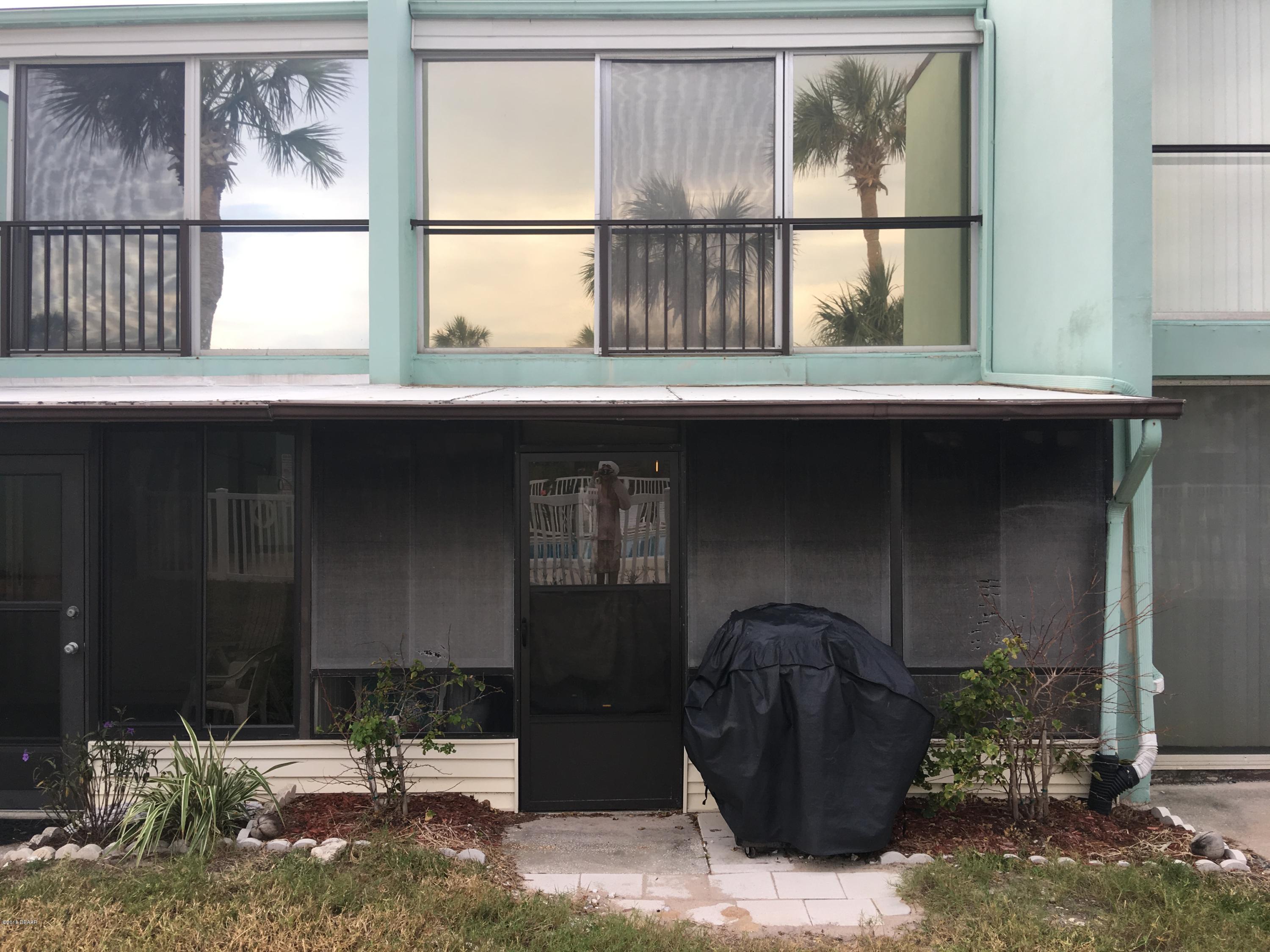 5500 Ocean Shore Boulevard, Unit 52 Ormond Beach, FL 32176 - Photo 17 of 33 a front view of a house with outdoor space