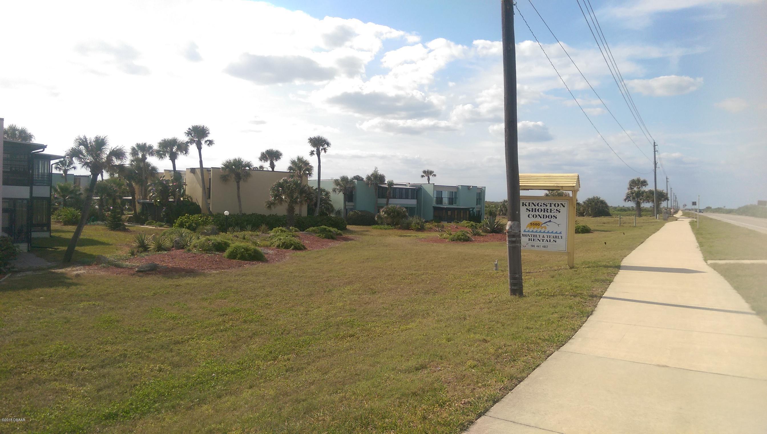5500 Ocean Shore Boulevard, Unit 52 Ormond Beach, FL 32176 - Photo 31 of 33 a view of a swimming pool with a lake