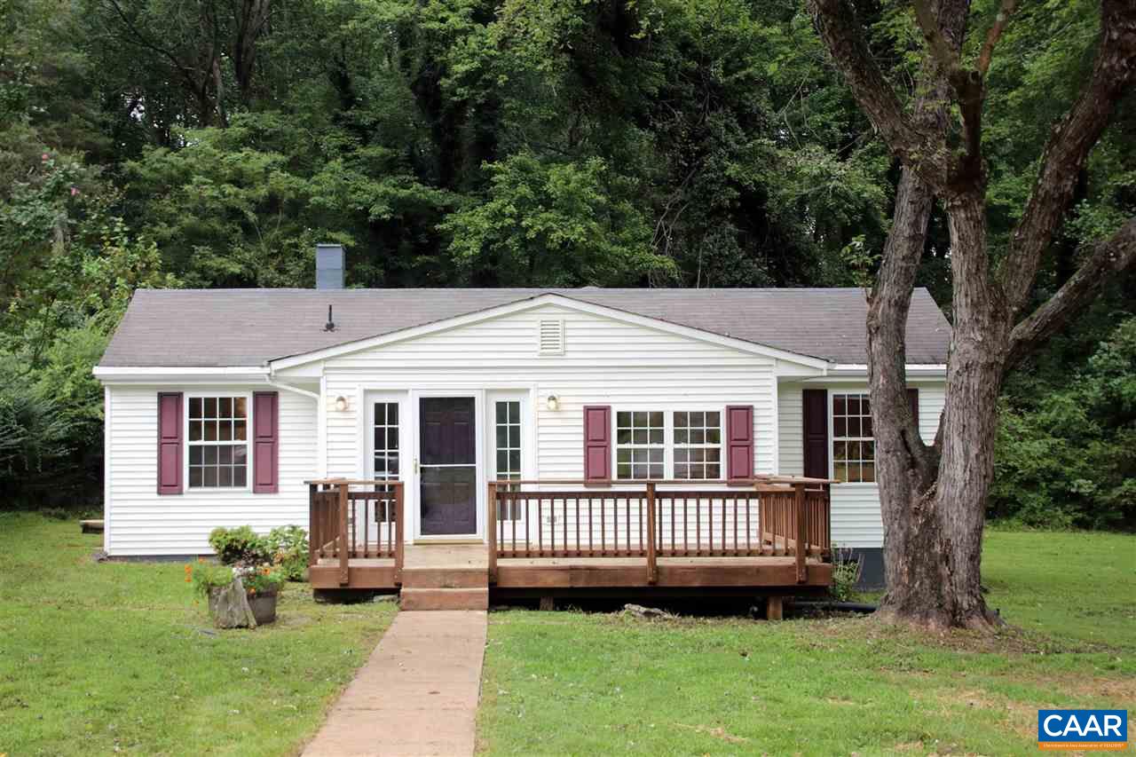 6773 Orange Road Orange, VA 22960 - Photo 2 of 31 a backyard of a house with a garden and deck