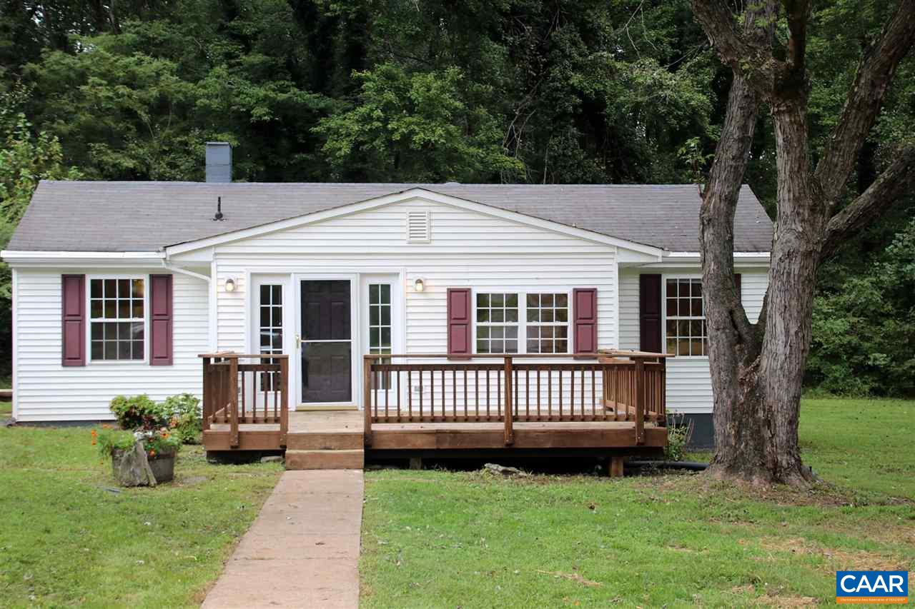 6773 Orange Road Orange, VA 22960 - Photo 3 of 31 a front view of a house with a garden