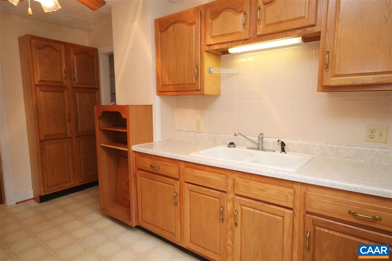 6773 Orange Road Orange, VA 22960 - Photo 10 of 31 a kitchen with a sink and refrigerator