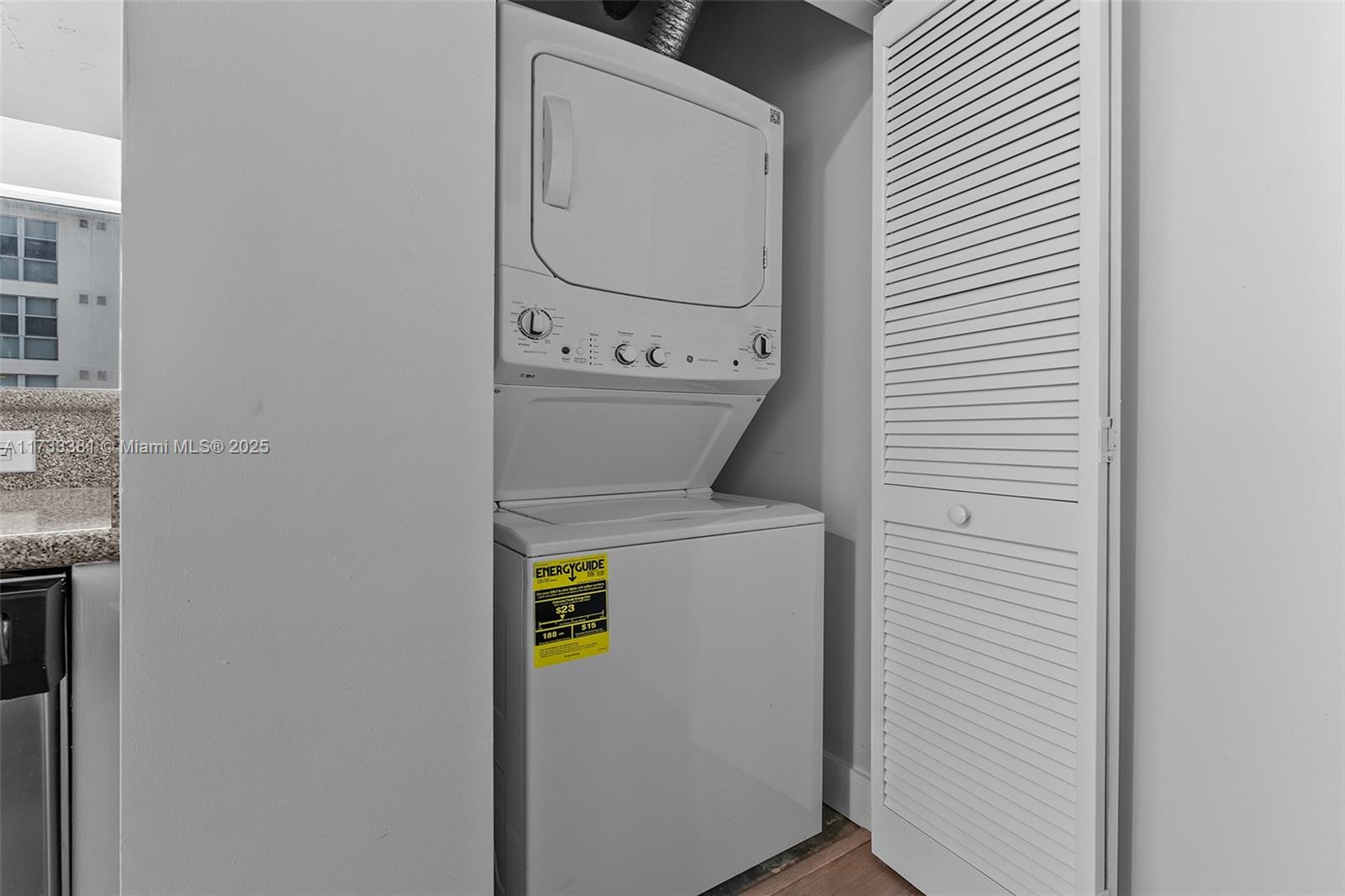 455 Northeast 25th Street, Unit 509 Miami, FL 33137 - Photo 15 of 30 a utility room with dryer and washer