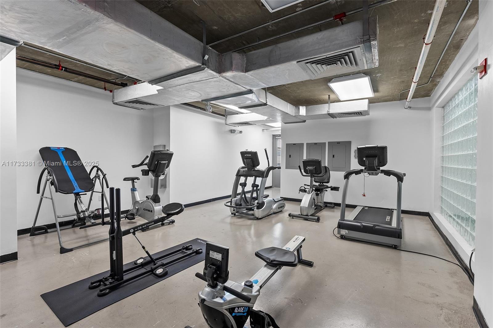 455 Northeast 25th Street, Unit 509 Miami, FL 33137 - Photo 20 of 30 a view of a room with gym equipment