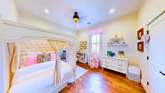 a very nice looking room with a big bed