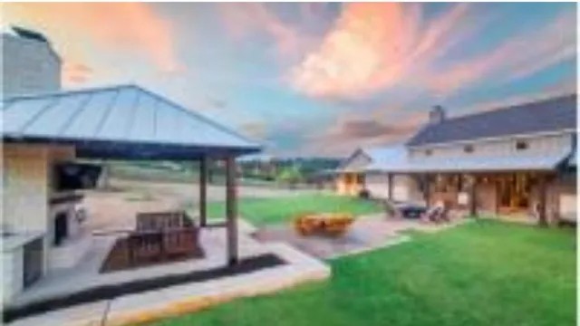 a view of a porch and a back yard