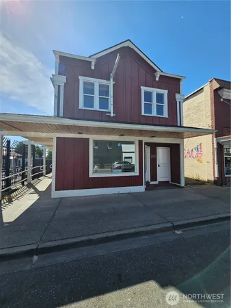 a front view of a house with yard