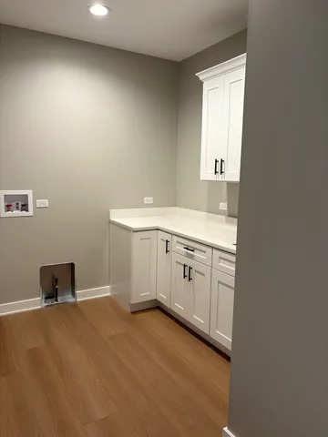 a view of a storage & utility room in a kitchen