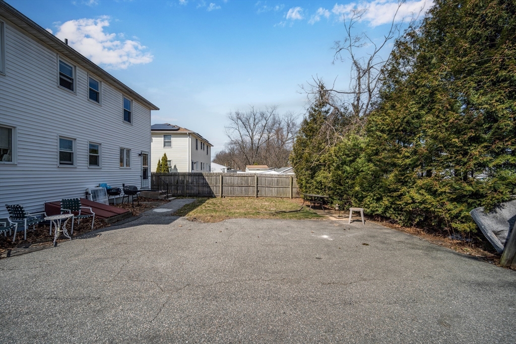 71 Price Street Springfield, MA 01104 - Photo 42 of 42 a view of a house with backyard and sitting area