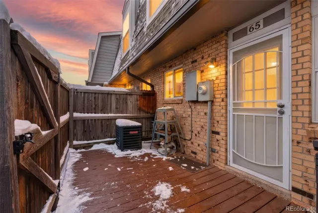 a view of deck with wooden floor and outdoor seating