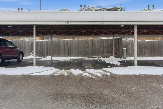 a view of a car park in front of a building