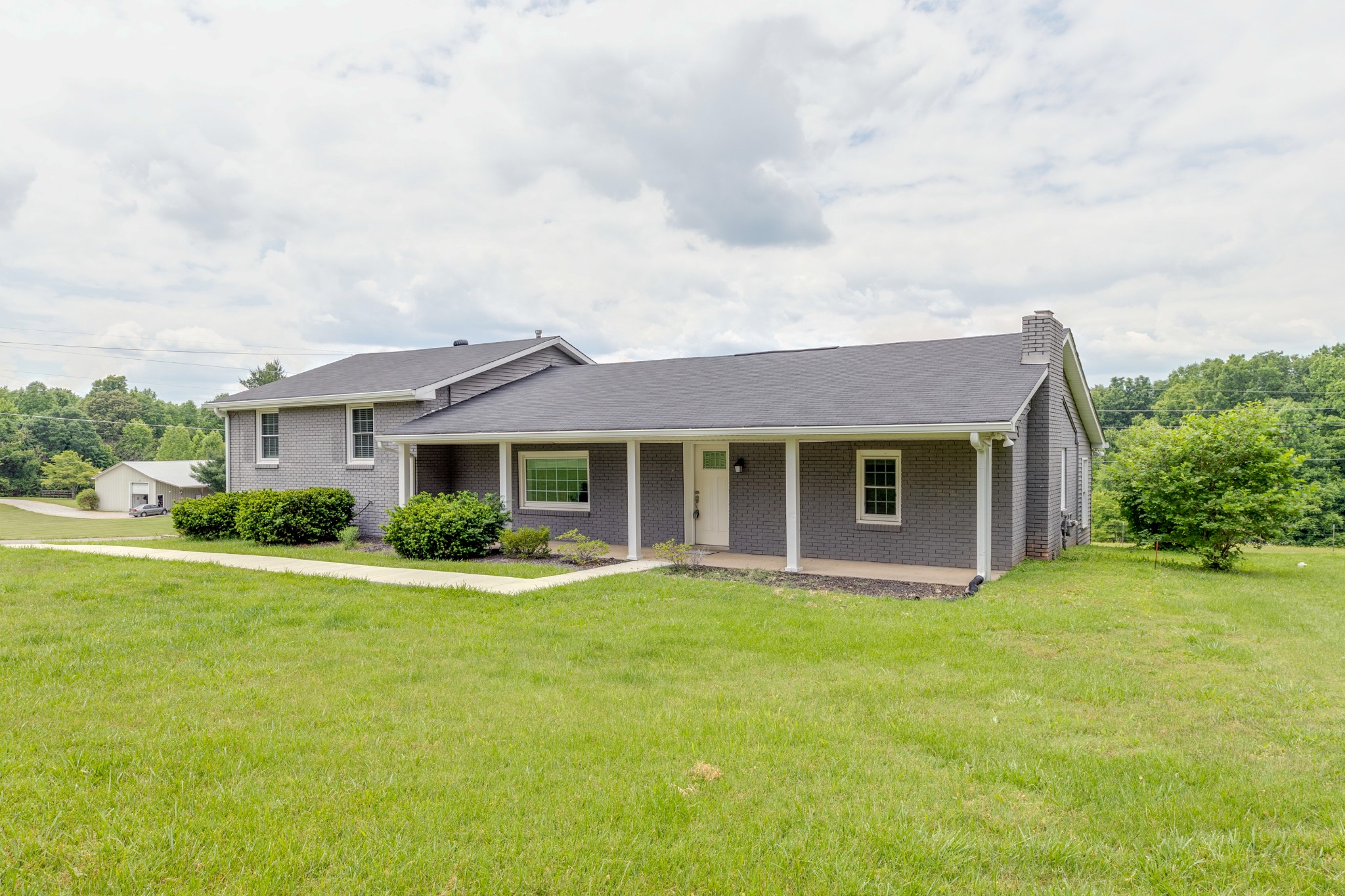 front view of a house with a yard