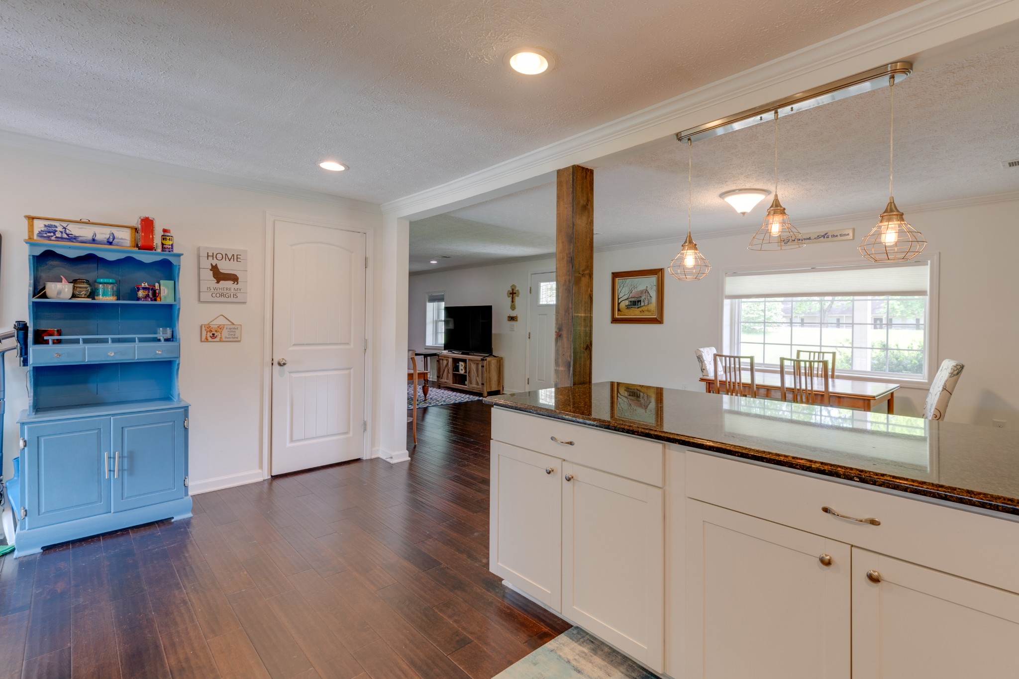 1765 Hayshed Road Charlotte, TN 37036 - Photo 17 of 34 a kitchen with granite countertop white cabinets and white appliances