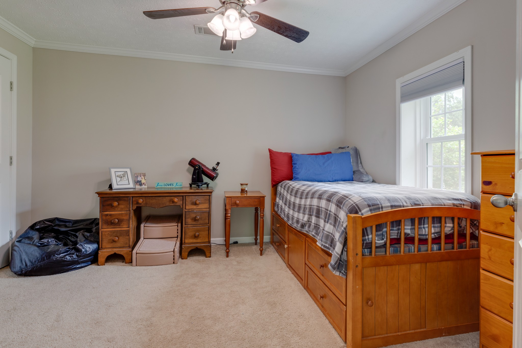 1765 Hayshed Road Charlotte, TN 37036 - Photo 18 of 34 a bedroom with furniture and a window