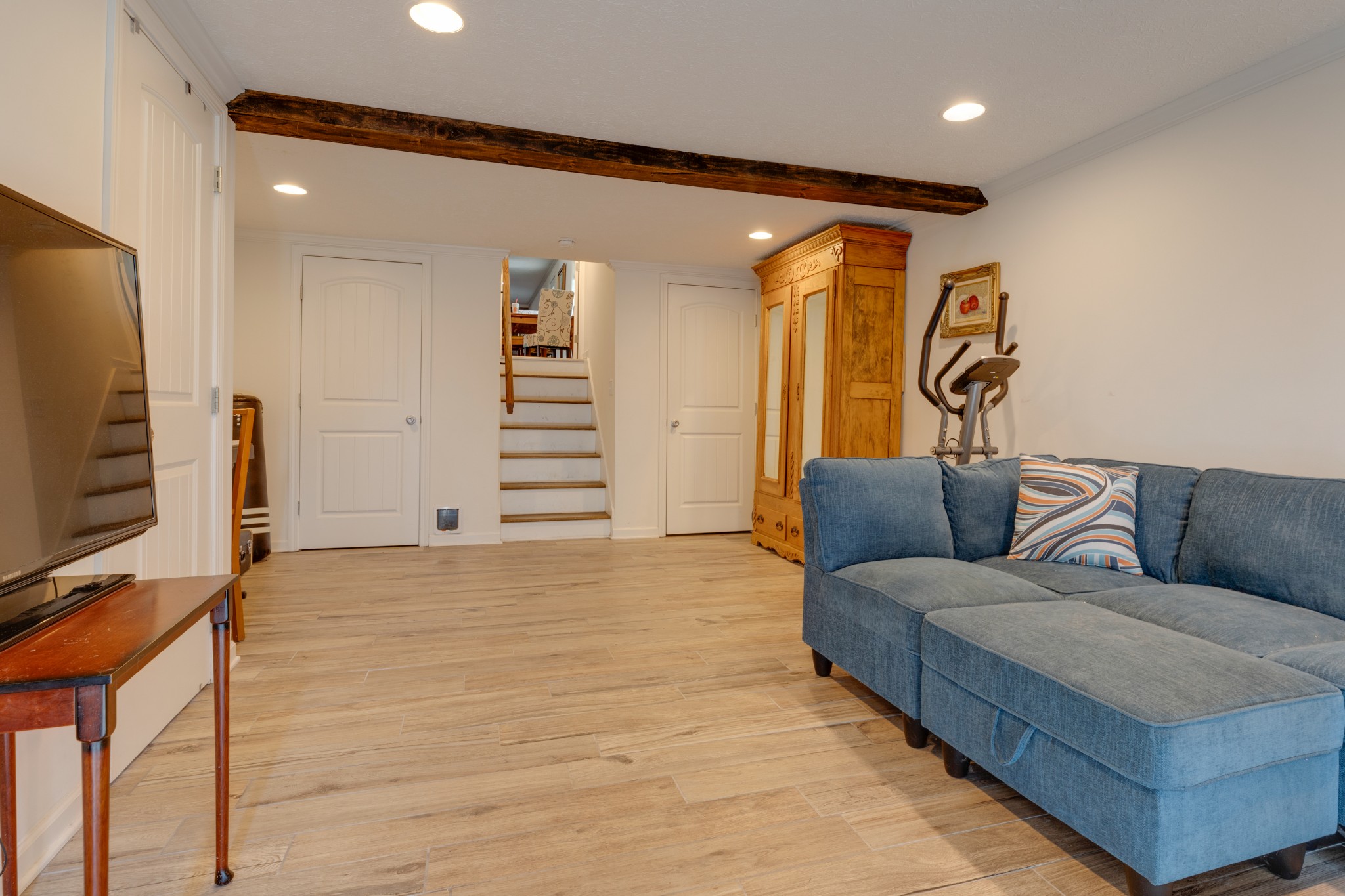 1765 Hayshed Road Charlotte, TN 37036 - Photo 29 of 34 a living room with furniture and a flat screen tv